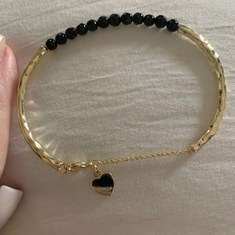 Delicate gold and onyx bracelets!